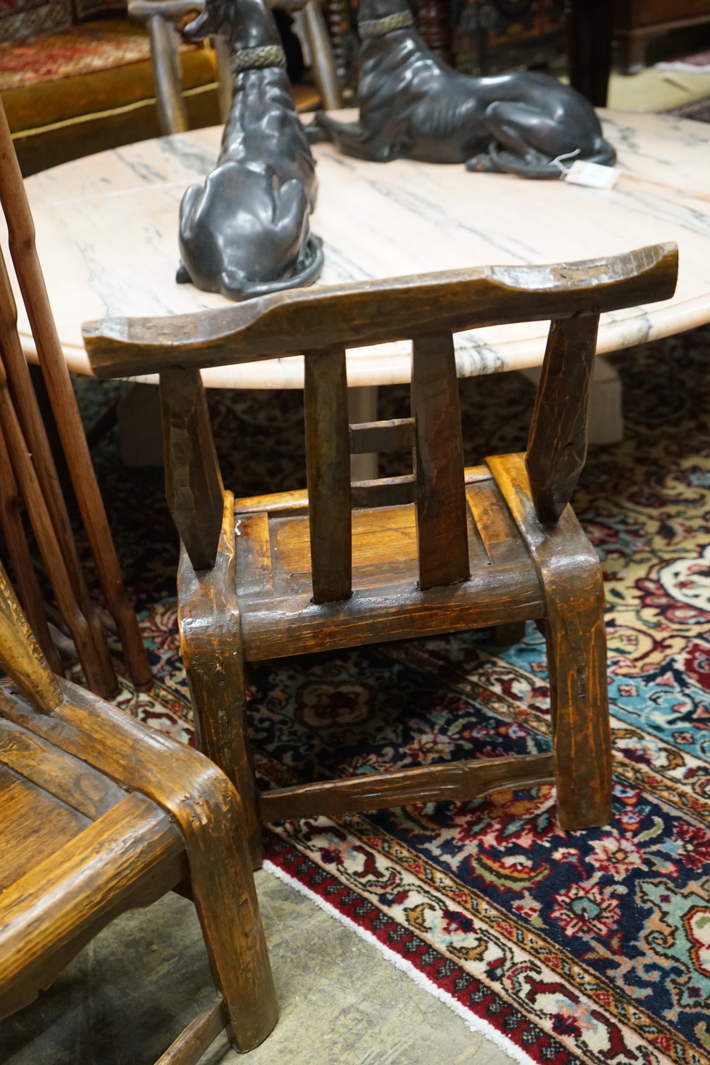 Four Chinese elm yoke back child's chairs